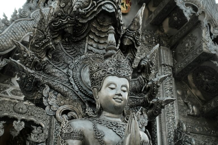 Silver deity sculpture