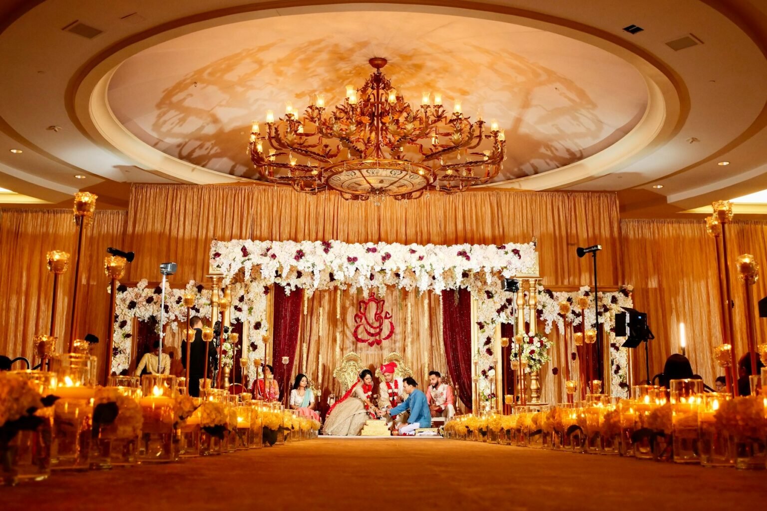 Wedding ritual under a floral canopy